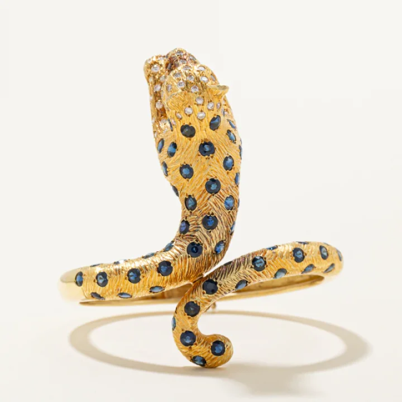 Maramenos & Pateras' Sapphire, Diamond & Pink Sapphire Panther Bracelet